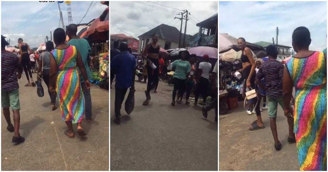 Very tall woman in Nigerian market Very tall woman in Nigerian market