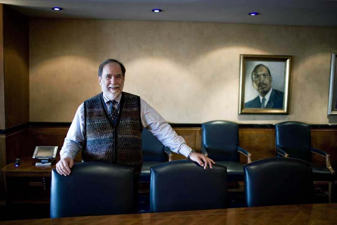 Nicky Oppenheimer stands in a De Beers boardroom in Gaborone