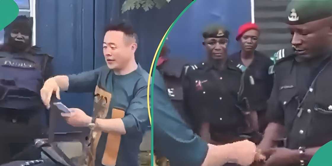 Police accepting money from Chinese men Police accepting money from Chinese men