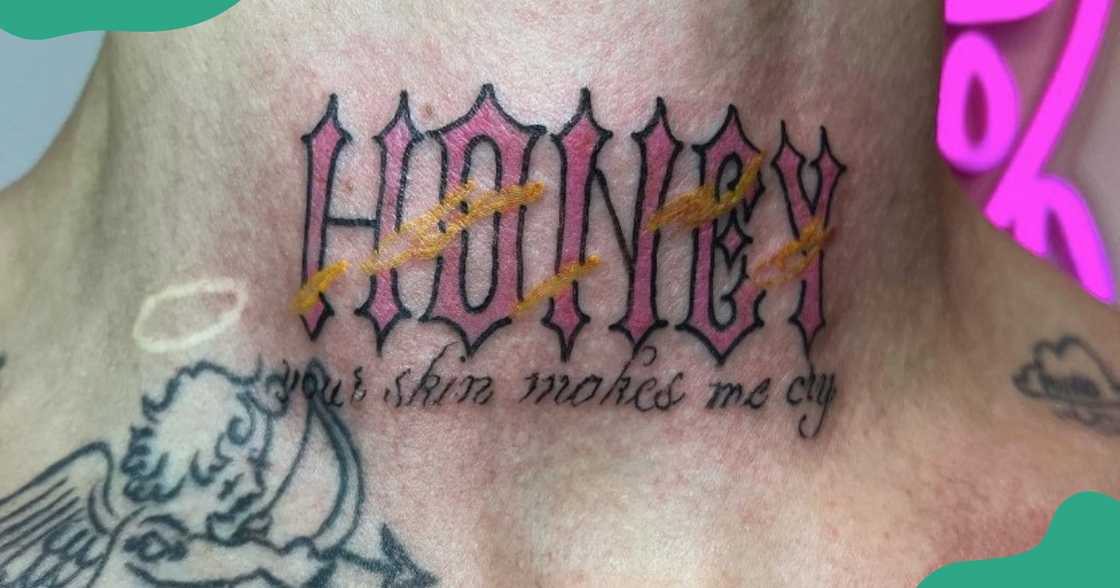 A script style throat tattoo using an Angel Wish font.