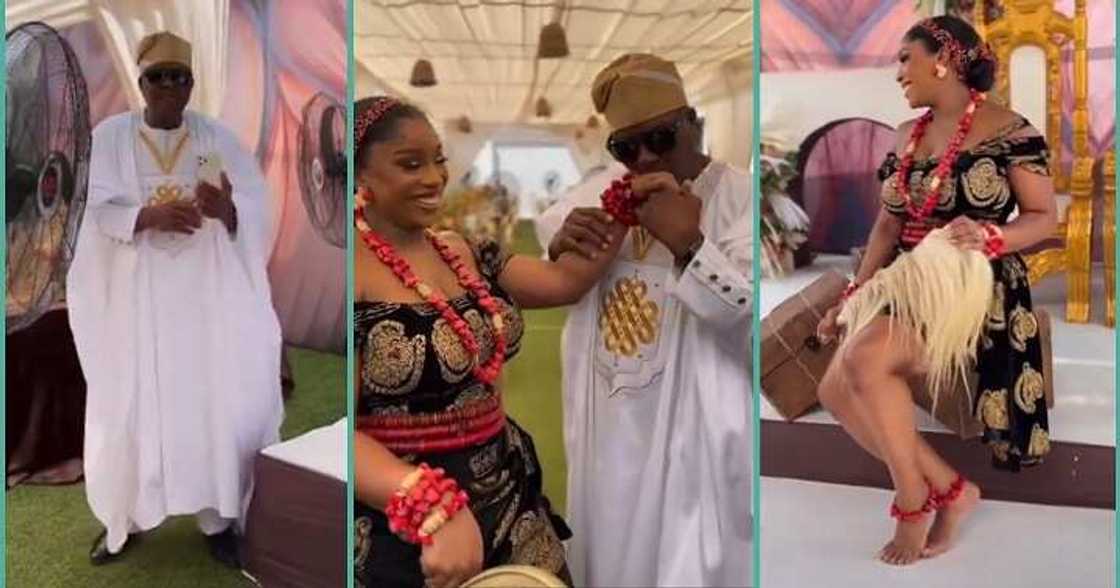 Bride's father kisses her hand during wedding, dotes on her Bride's father kisses her hand during wedding, dotes on her