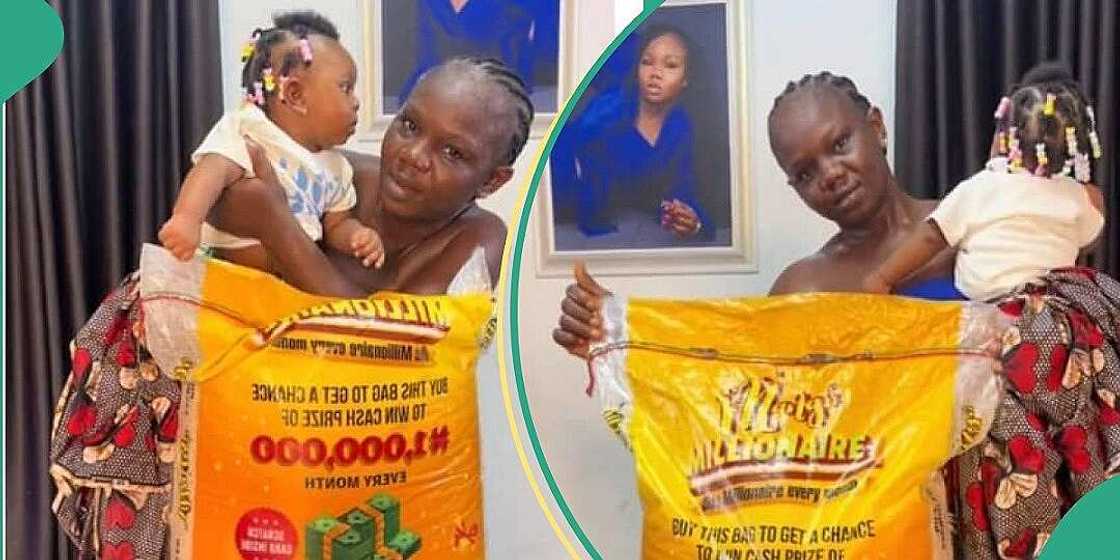 Nigerian woman poses with N75k bag of rice