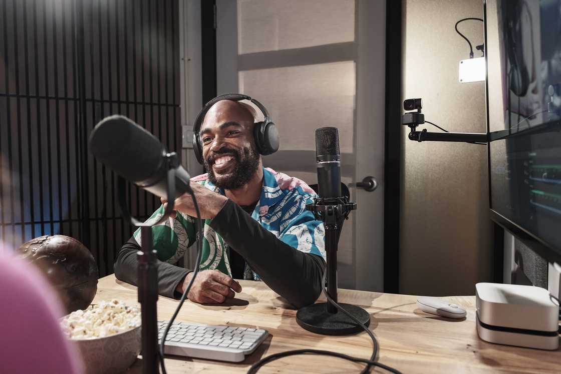 A man hosting student podcast online A man hosting student podcast online