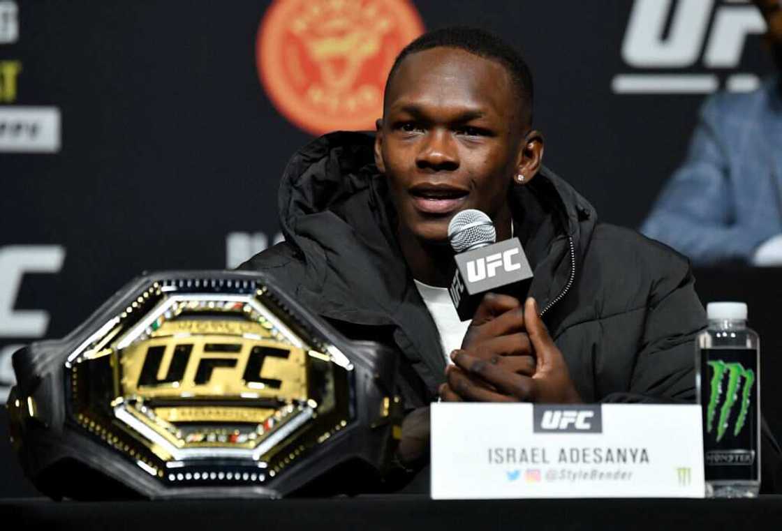 Nigerian-born UFC fighter Adesanya gifts mum Porshe SUV worth over N50m ahead of bout against Blachowicz Nigerian-born UFC fighter Adesanya gifts mum Porshe SUV worth over N50m ahead of bout against Blachowicz