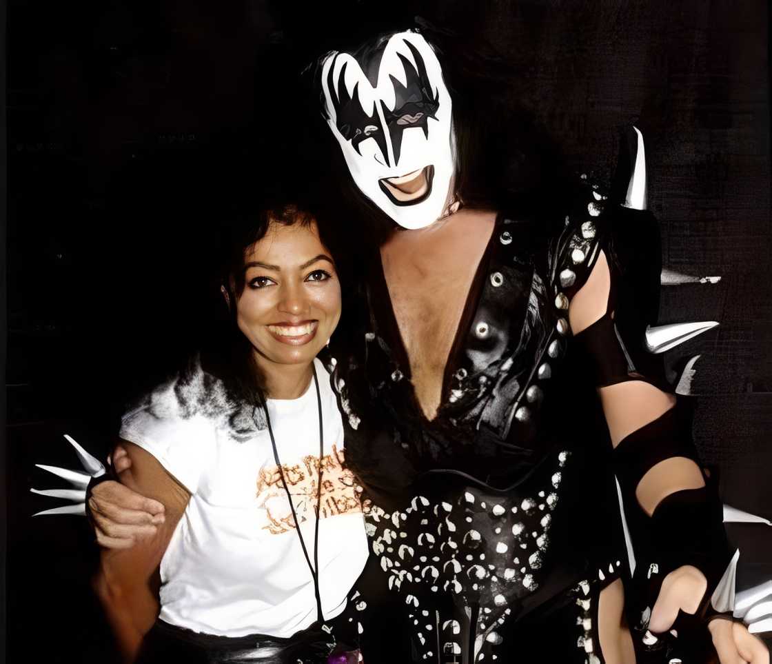Diana Ross posing backstage with Gene Simmons of KISS in his full "Demon" stage costume. Diana Ross posing backstage with Gene Simmons of KISS in his full "Demon" stage costume.