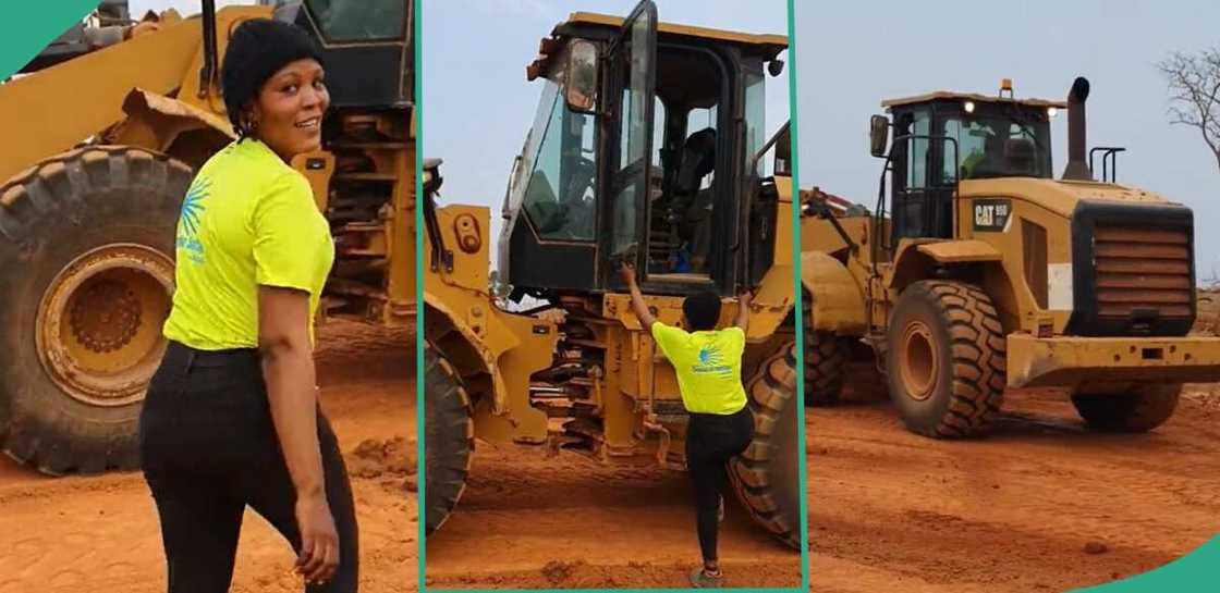 Lady drives heavy construction vehicle.