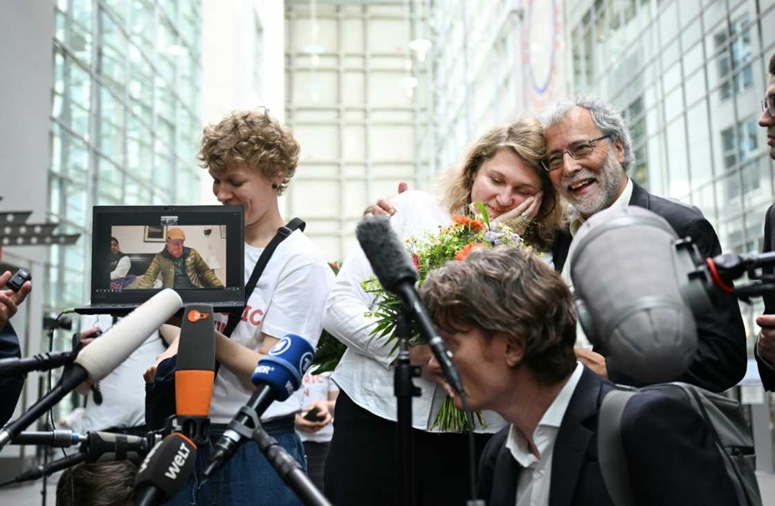 The ruling was a 'milestone' for climate litigation, Peruvian farmer Saul Luciano Lliuya's lawyer Roda Verheyen (C) said in a statement The ruling was a 'milestone' for climate litigation, Peruvian farmer Saul Luciano Lliuya's lawyer Roda Verheyen (C) said in a statement