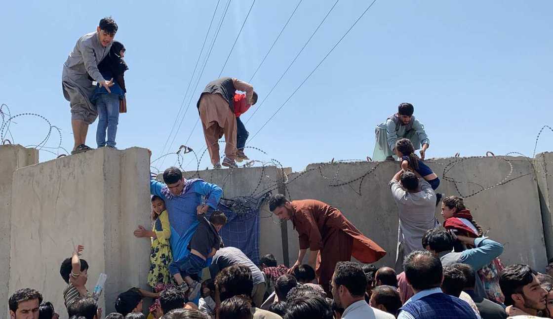 Chaos in Kabul airport as people attempt to flee.