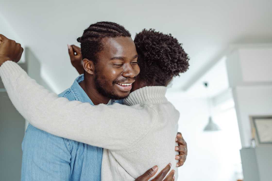 A brother and sister hug A brother and sister hug