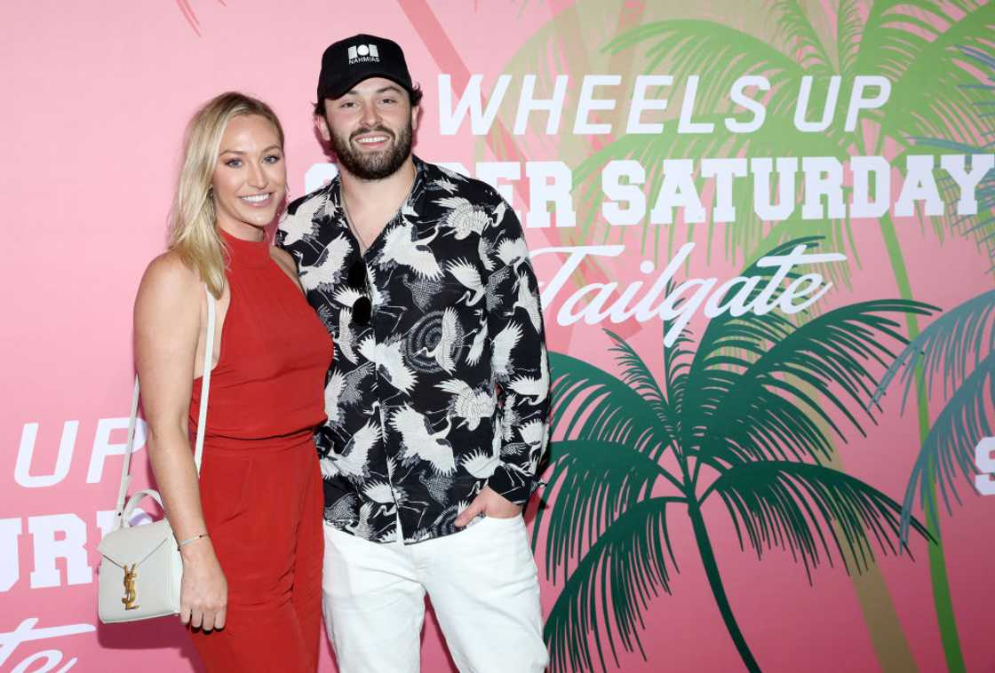 Emily Wilkinson and Baker Mayfield at the Wheels Up members-only Super Saturday Tailgate event in Wynwood, Miami Emily Wilkinson and Baker Mayfield at the Wheels Up members-only Super Saturday Tailgate event in Wynwood, Miami