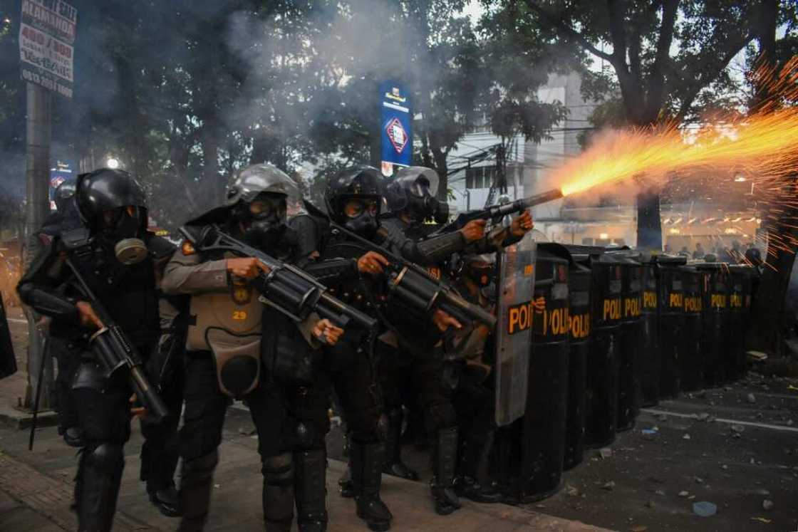 Indonesian police have spent millions on tactical gear including gas masks and batons Indonesian police have spent millions on tactical gear including gas masks and batons