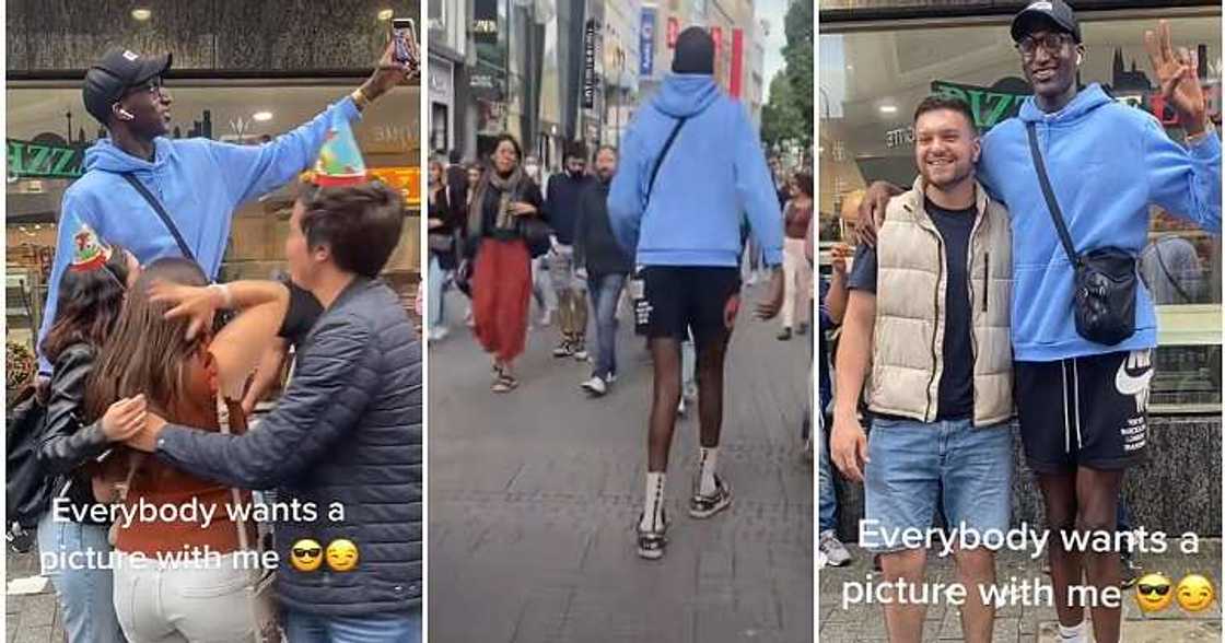 Very tall black man, oyinbo people take photos 7.2ft tall Very tall black man, oyinbo people take photos 7.2ft tall