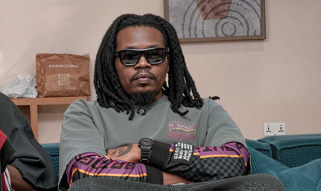 Nigerian rapper, Olamide, smiles and gestures while sitting during an interview on Flow with Korty Nigerian rapper, Olamide, smiles and gestures while sitting during an interview on Flow with Korty