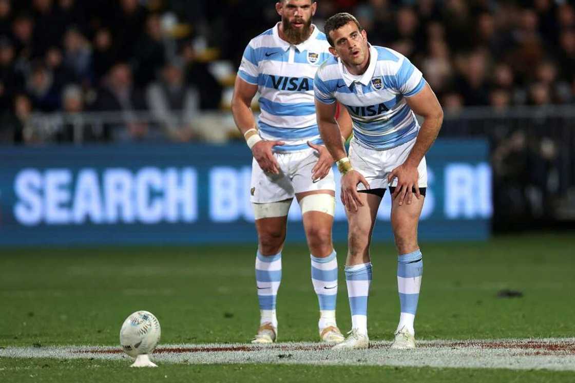 Argentine Emiliano Boffelli (R) prepares to kick a penalty against New Zealand in Christchurch on August 27, 2022, with teammate Marcos Kremer watching. Argentine Emiliano Boffelli (R) prepares to kick a penalty against New Zealand in Christchurch on August 27, 2022, with teammate Marcos Kremer watching.