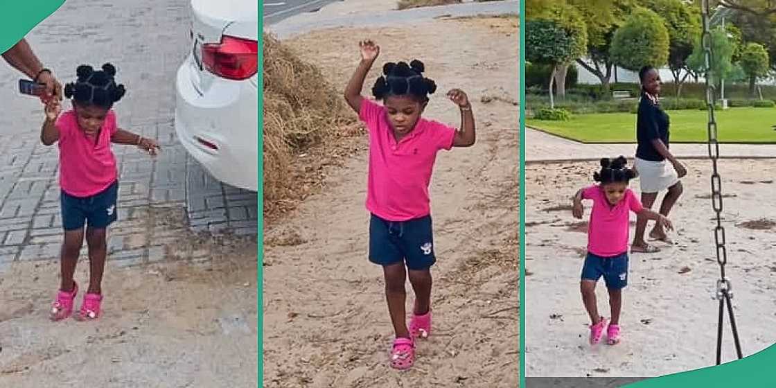 Little girl afraid to walk on sand