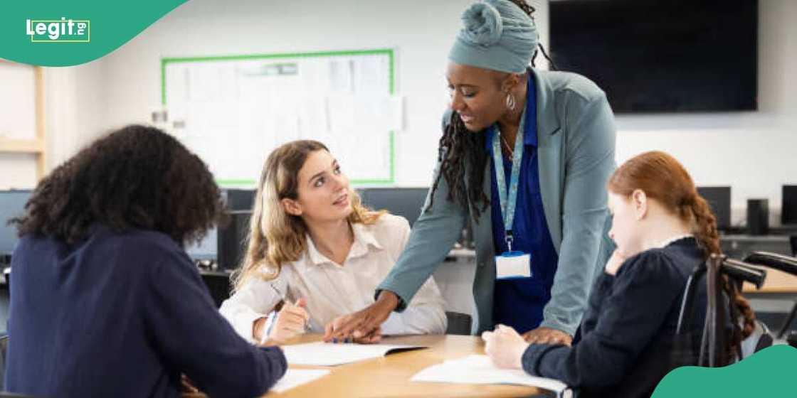 Black woman addressing white ladies Black woman addressing white ladies
