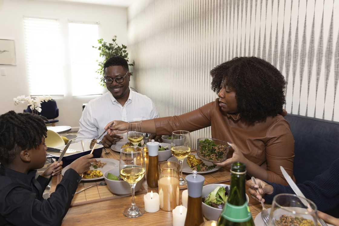 A family sits together for dinner
