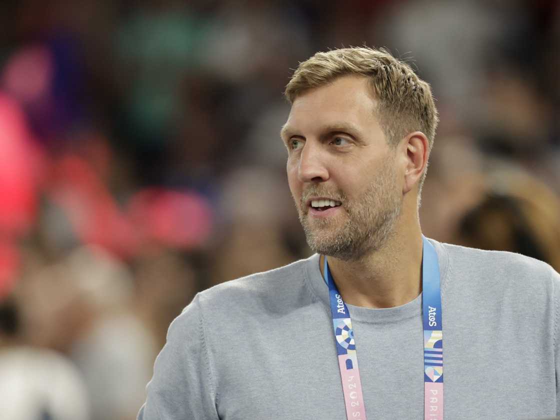 Dirk Nowitzki looks on during the Women's Gold Medal game between Team France and Team United States at Bercy Arena in Paris Dirk Nowitzki looks on during the Women's Gold Medal game between Team France and Team United States at Bercy Arena in Paris