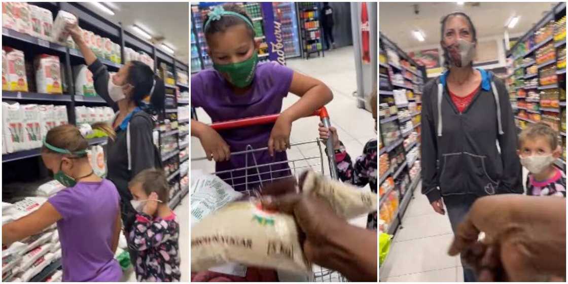 Video shows moment woman who had gone to get maize for her kids was gifted open cheque and cash by stranger Video shows moment woman who had gone to get maize for her kids was gifted open cheque and cash by stranger