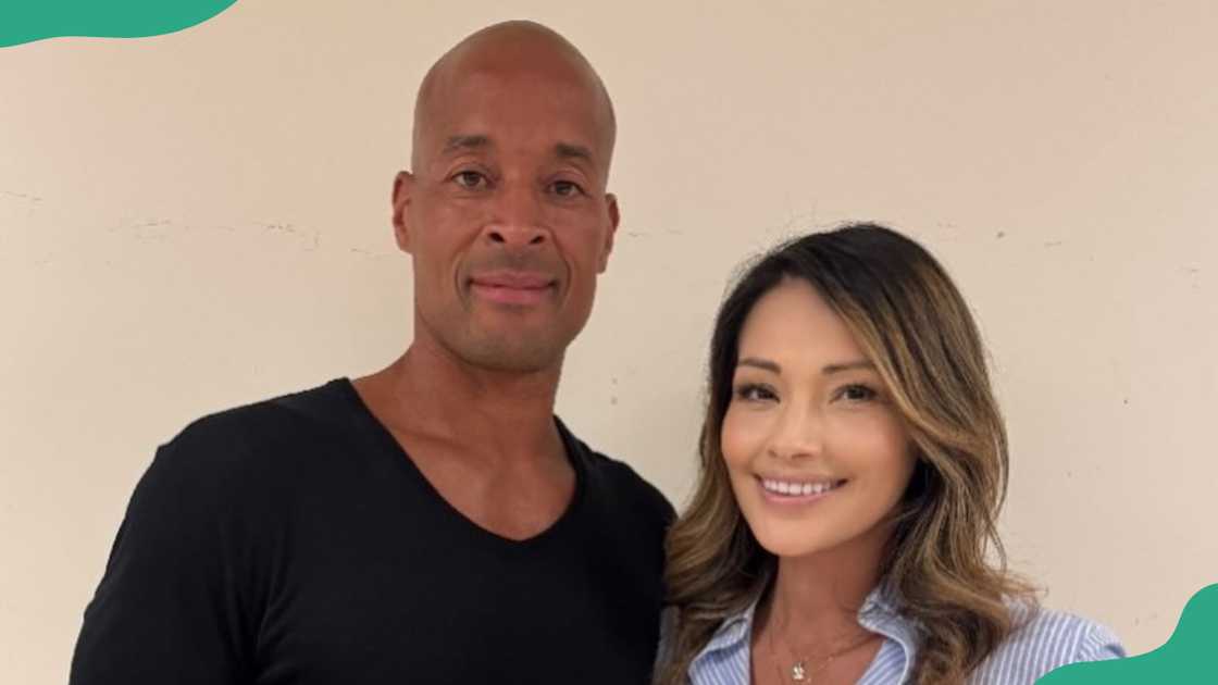 David Goggins smiles as he poses for a picture alongside a lady David Goggins smiles as he poses for a picture alongside a lady