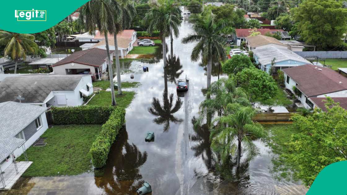 Flooding kills 5 lives, including elderly US election workers