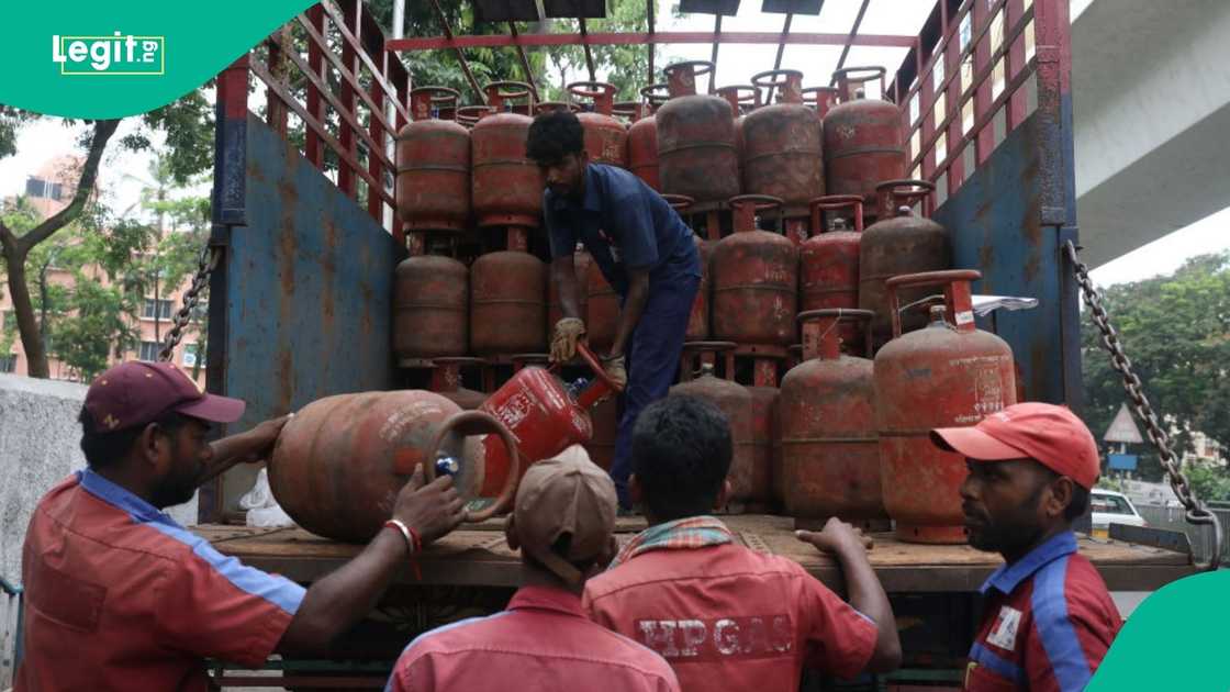 LPG cylinders being uploaded to a gas plant