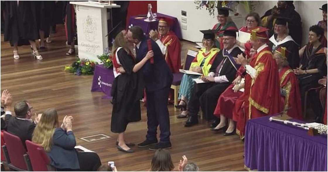 Double celebration as man proposes to girlfriend during her graduation Double celebration as man proposes to girlfriend during her graduation