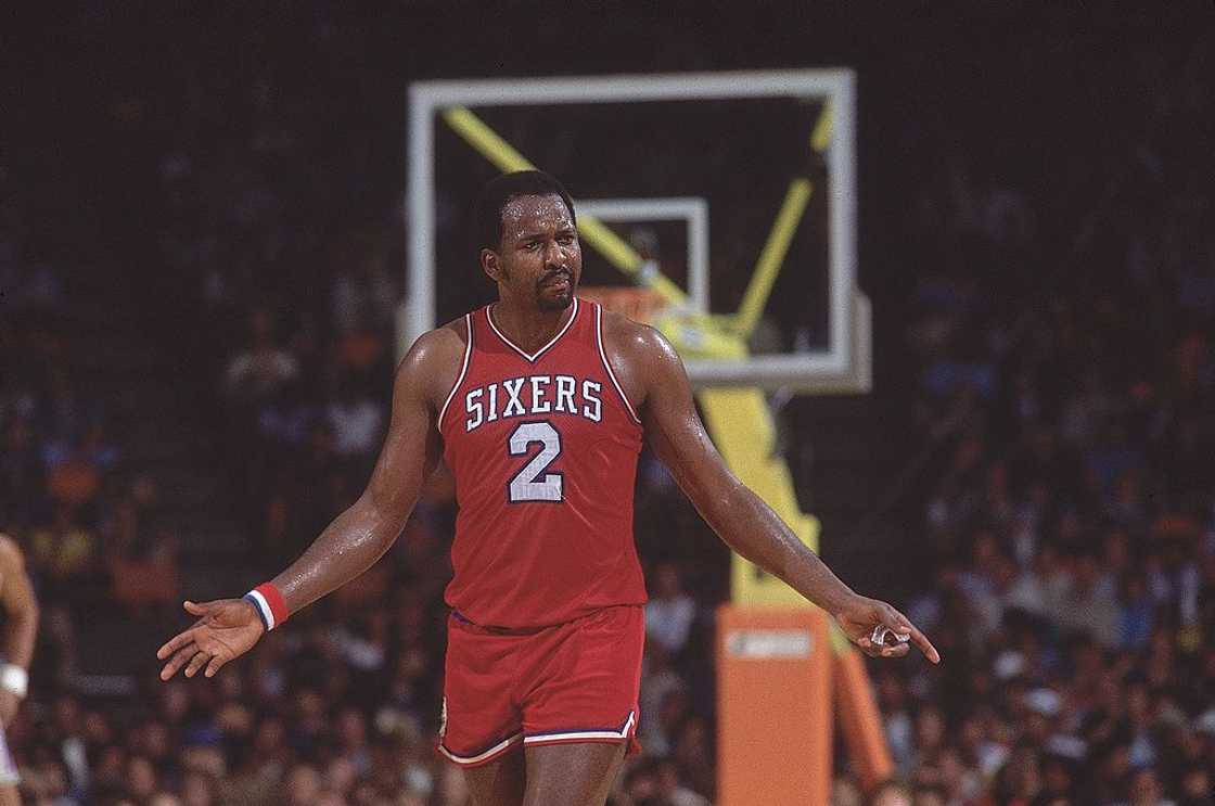 Moses Malone upset during a game against Los Angeles Lakers