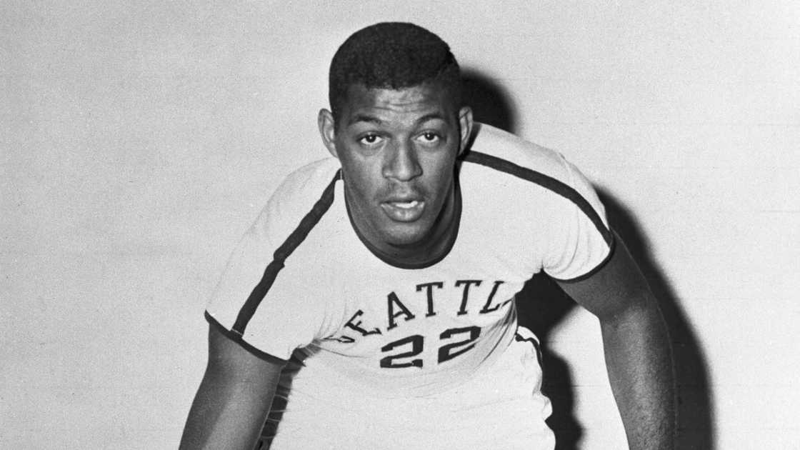 Elgin Baylor of Seattle University's basketball team pictured dribbling a basketball.