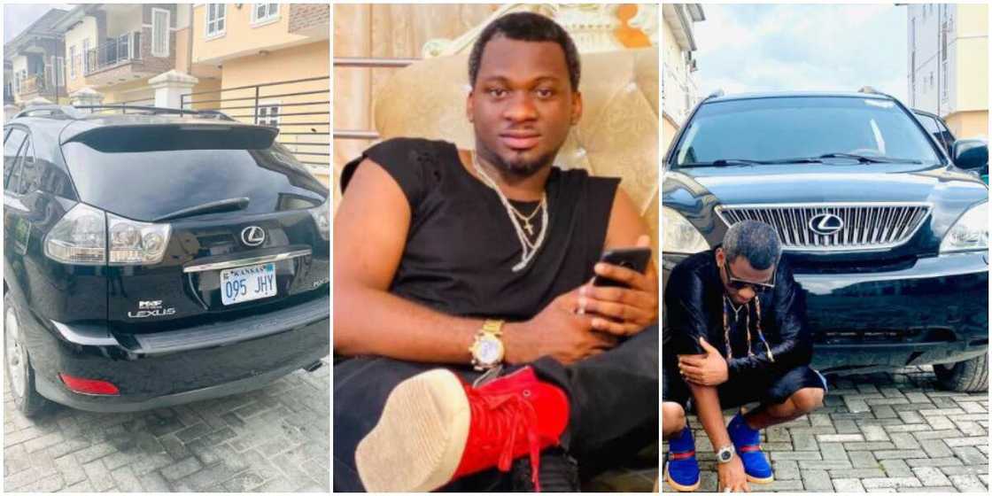Prince Owelle poses with his car Prince Owelle poses with his car