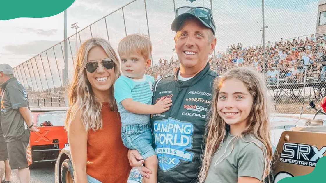 Greg Biffle with his wife and two kids in July 2022.