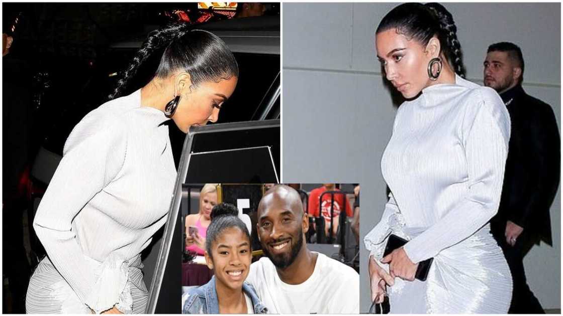 Kim Kardashian tied white satin wrapper and wore blouse to the service. Photo source: Daily Mail Kim Kardashian tied white satin wrapper and wore blouse to the service. Photo source: Daily Mail