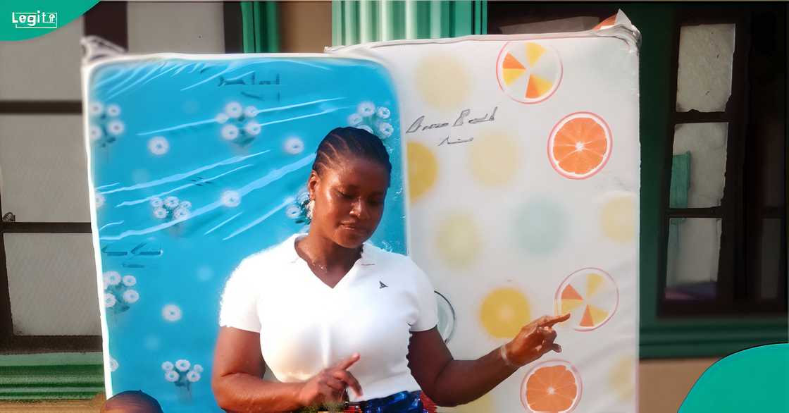 A Nigerian mother reacted as her sons received mattresses at their school’s graduation party. A Nigerian mother reacted as her sons received mattresses at their school’s graduation party.