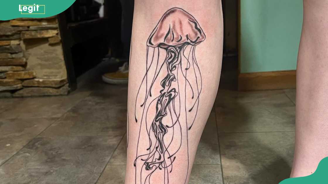 Jellyfish leg tattoo