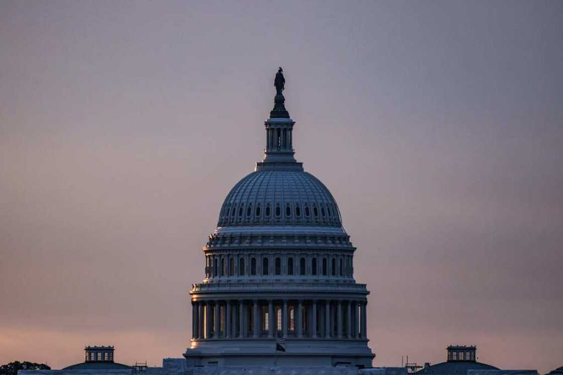 Fitch's decision to cut the US debt rating follows the long-running standoff on Capitol Hill earlier this year that saw the world's top economy flirt with a possible default, which rattled markets Fitch's decision to cut the US debt rating follows the long-running standoff on Capitol Hill earlier this year that saw the world's top economy flirt with a possible default, which rattled markets