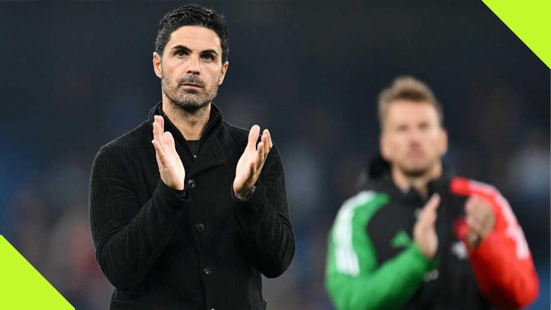Mikel Arteta applauds the traveling Arsenal fans after the 2-2 draw against Manchester City. Mikel Arteta applauds the traveling Arsenal fans after the 2-2 draw against Manchester City.