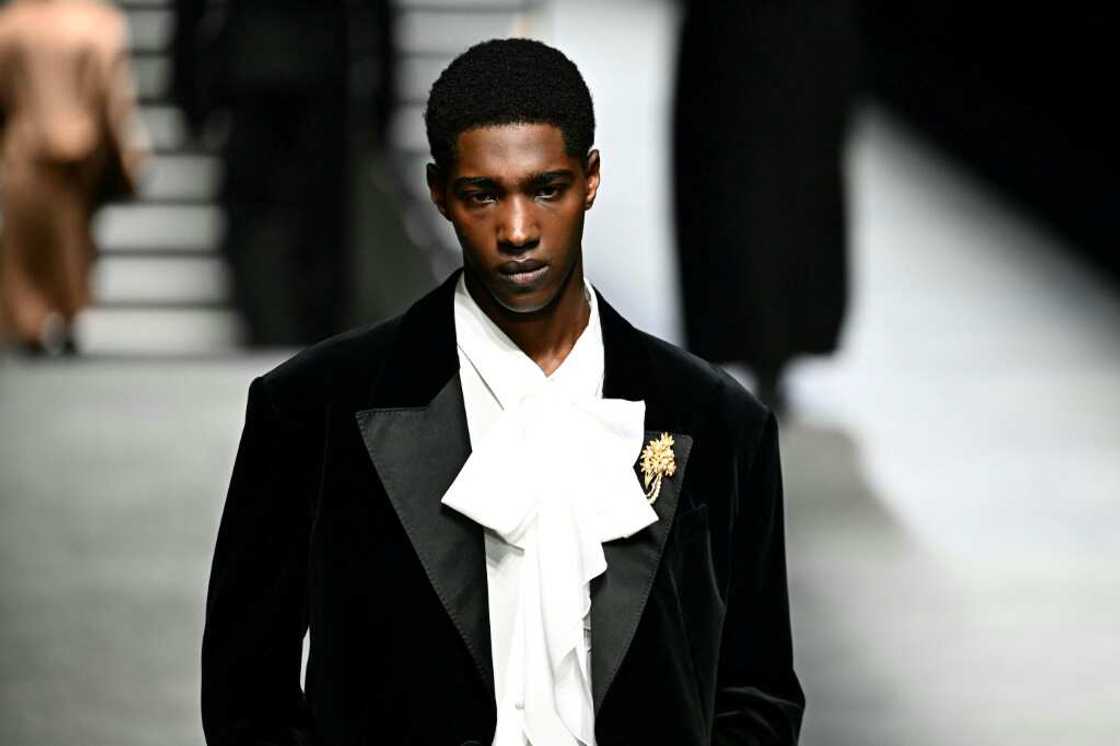 Lavalliere ties adorned razor-sharp tuxedos Lavalliere ties adorned razor-sharp tuxedos