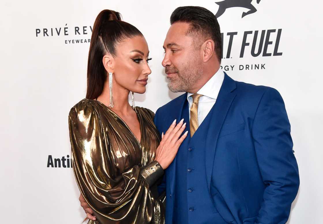 Holly Sonders and Oscar De La Hoya in Beverly Hills, California.