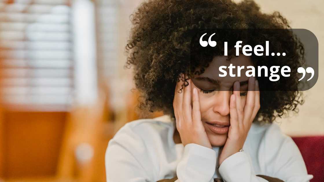 A woman holds her face in distress. A woman holds her face in distress.