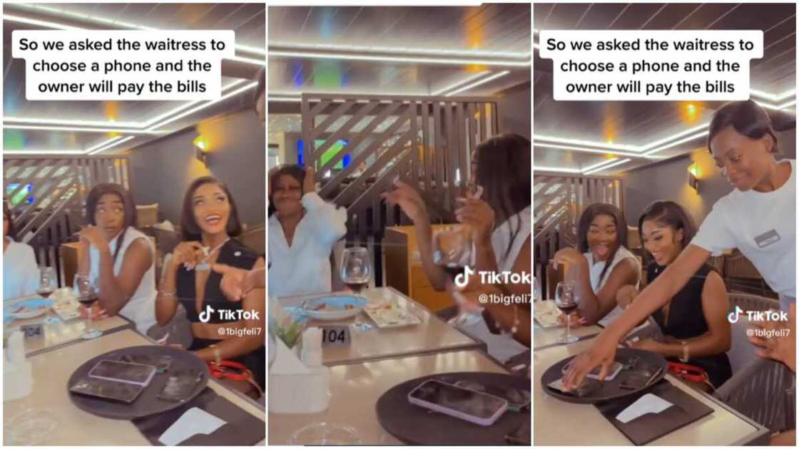 Ladies in restaurant/waitress picked a phone. Ladies in restaurant/waitress picked a phone.