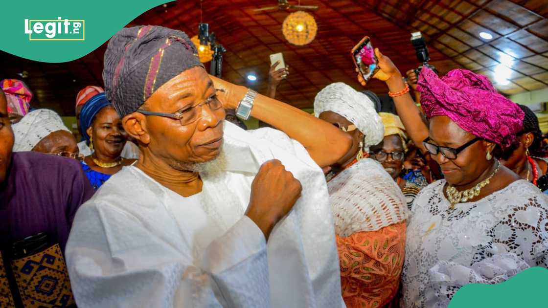 Former Governor of Osun State has denied sharing money to people on social media