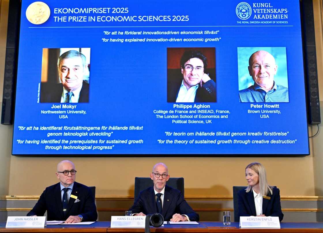 Members of the Swedish Academy of Sciences announce the Nobel economics prize winners, including Peter Howitt (R) Members of the Swedish Academy of Sciences announce the Nobel economics prize winners, including Peter Howitt (R)
