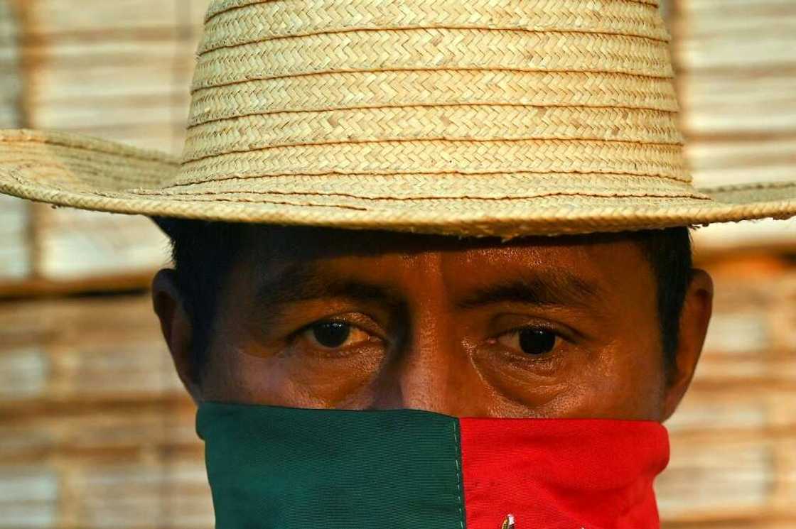 A Nasa indigenous man is pictured at an occupied property in Corinto, department of Cauca, Colombia