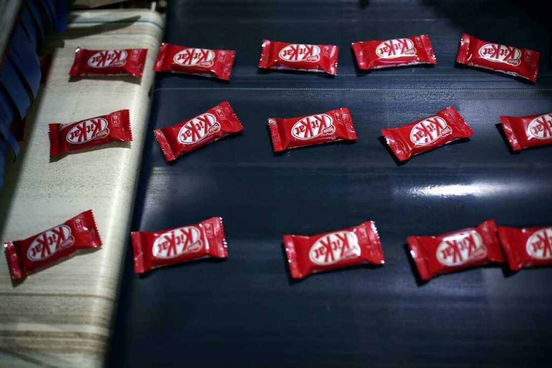 Inflation cut profit margins of Nestle, which makes KitKats and many other food products Inflation cut profit margins of Nestle, which makes KitKats and many other food products
