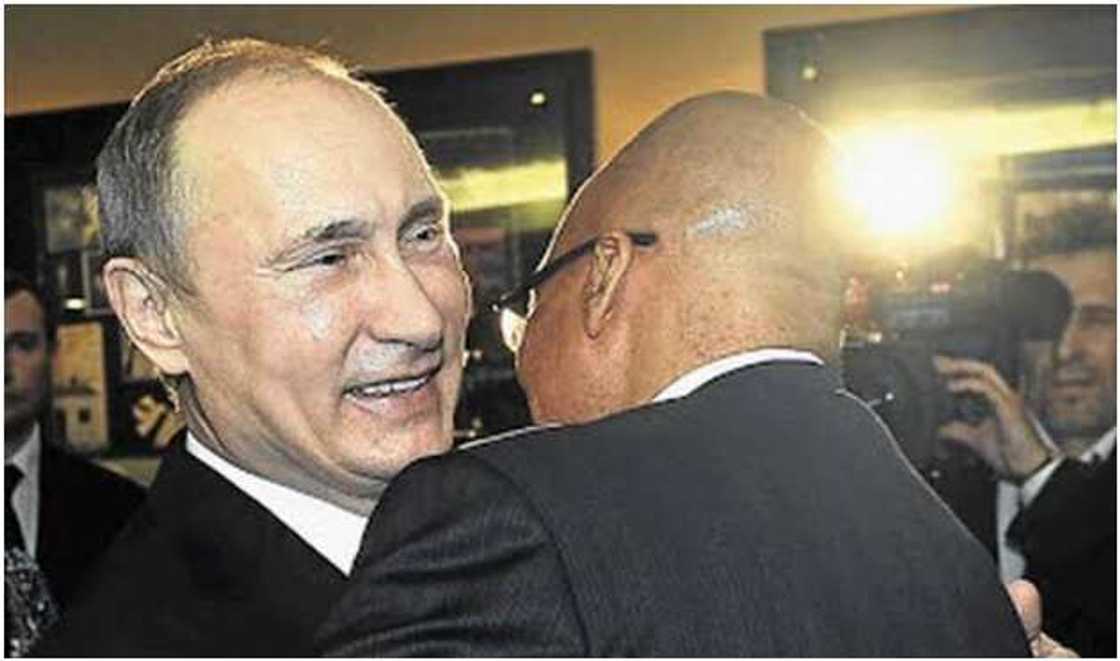 Putin hugging Zuma Putin hugging Zuma