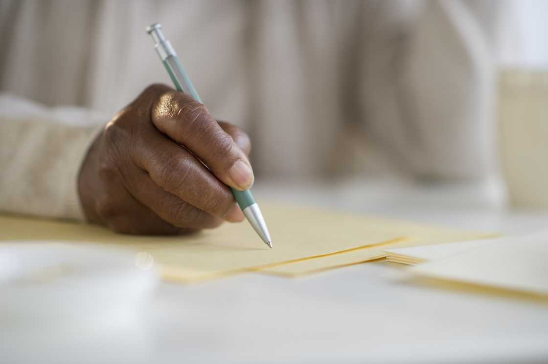 A woman writing letter A woman writing letter