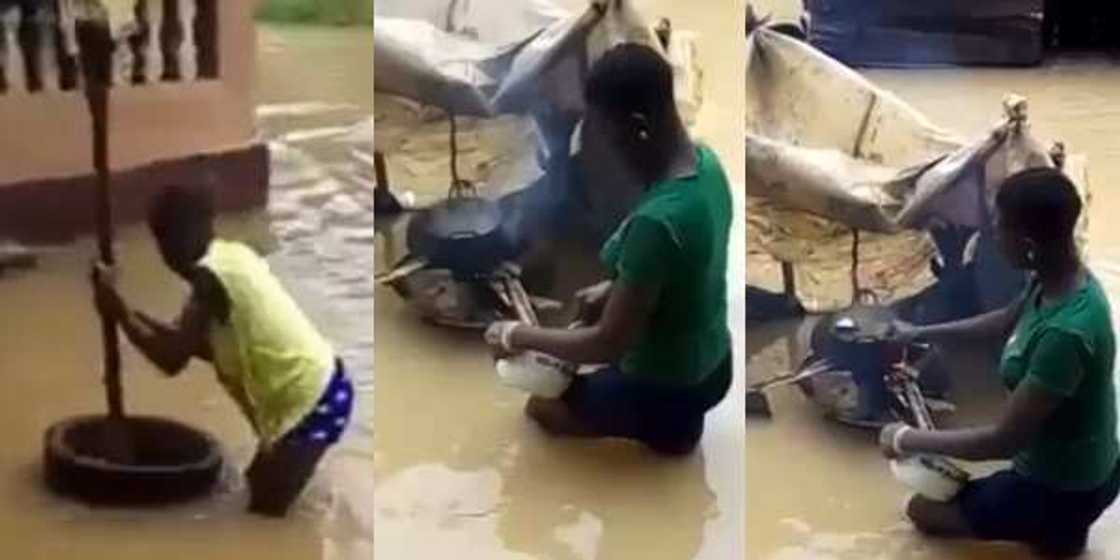 Reactions as Nigerian Ladies are Seen Cooking, Pounding Food Inside Lagos Flood