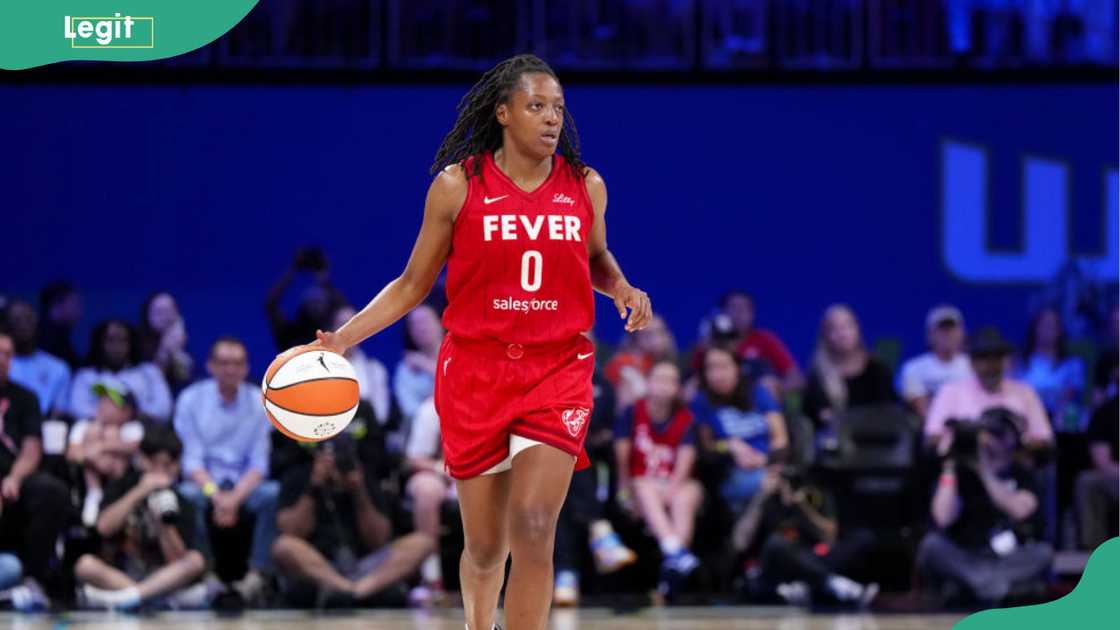 Kelsey Mitchell brings the ball up the court Kelsey Mitchell brings the ball up the court