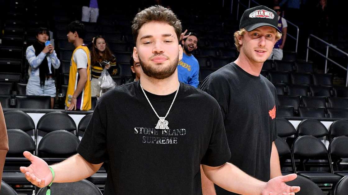 Ross poses for a photo during a basketball game between the Los Angeles Lakers and the Cleveland Cavaliers.