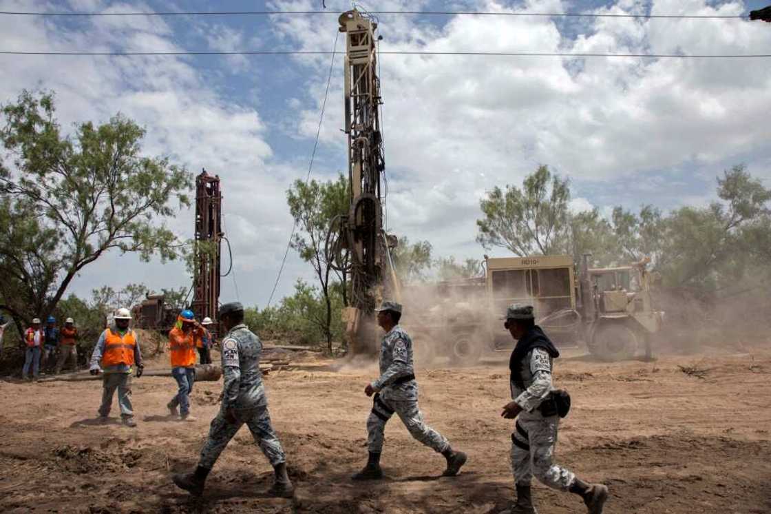 Rescuers work at a coal mine in northern Mexico where 10 people are trapped Rescuers work at a coal mine in northern Mexico where 10 people are trapped